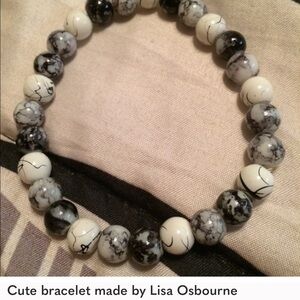 4 total bracelets made by Lisa Osborne